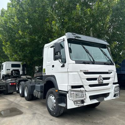 Harga yang bagus SINOTRUK HOWO SEMI TRAILER TRACTOR TRUCK HEAD WITH AIR CONDITIONER 60-70 TONS 371HP 380HP 400HP 420HP WEICHAI dan mesin SINOTRUCK on line